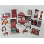A quantity of wooden dolls house furniture including grand piano, bureau, telephone table,