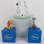 Two metal and enamel Disney figures being Lady and Tramp,