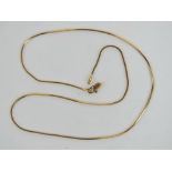 A yellow metal snake link necklace, no apparnet hallmarks, clasp a/f, 4g.