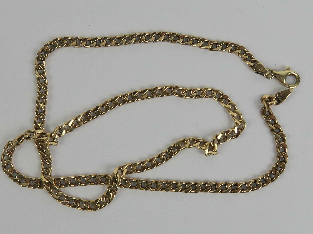 A 9ct gold flattened curb link necklace, hallmarked 375, measuring 54cm in length and weighing 11.