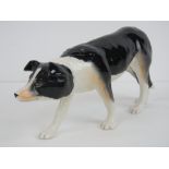 A John Beswick tri-colour Border Collie, JBD58, approx 19cm in length.