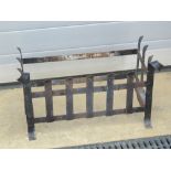 A blacksmith made wrought iron fire grate, 54cm wide.