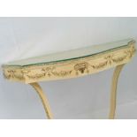 A reproduction Continental Empire style shaped console table with glass cover, 76cm wide,