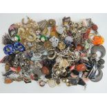 A large quantity of assorted costume jewellery earrings, approx 62 pairs.