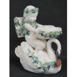 A good 19th century table centrepiece of a boy riding a swan,