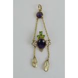 A stunning 'Suffragette' pendant set with amethysts, peridots and seed pearls,
