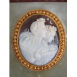 A superlative quality yellow metal shell cameo brooch c1880s featuring figures in relief upon with