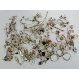 A large quantity of assorted silver and white metal earrings including three pairs of black