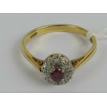 An 18ct gold ruby and diamond ring,