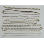 Fourteen silver chain link bracelets, 44g.