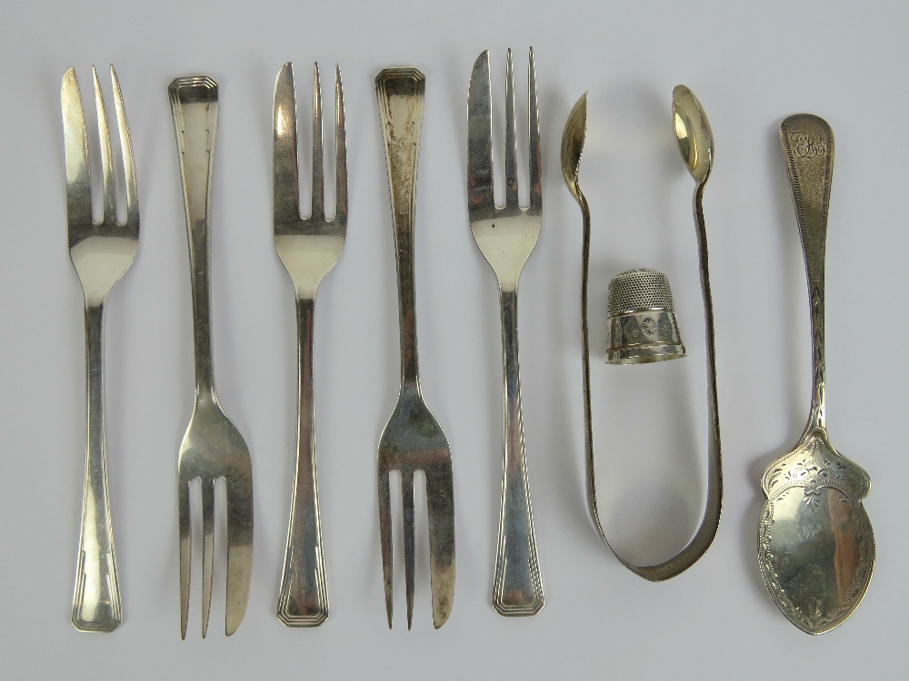 A set of five HM silver cake forks hallmarked Birmingham, together with a HM silver preserve spoon,
