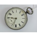 A HM silver key wind open face pocket watch having white enamel dial with black Roman numerals and