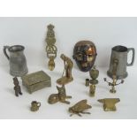 A quantity of assorted metalwares including two pewter tankards, a brass golfing figurine,