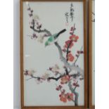 A pair of Oriental paintings on silk, framed and glazed.