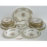 A Coalport 'Mig Rose' dinner service comprising sauce boat and drip tray, two serving bowls,