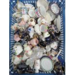 A large quantity of assorted miniature dolls tea service and decorative ceramic items including a