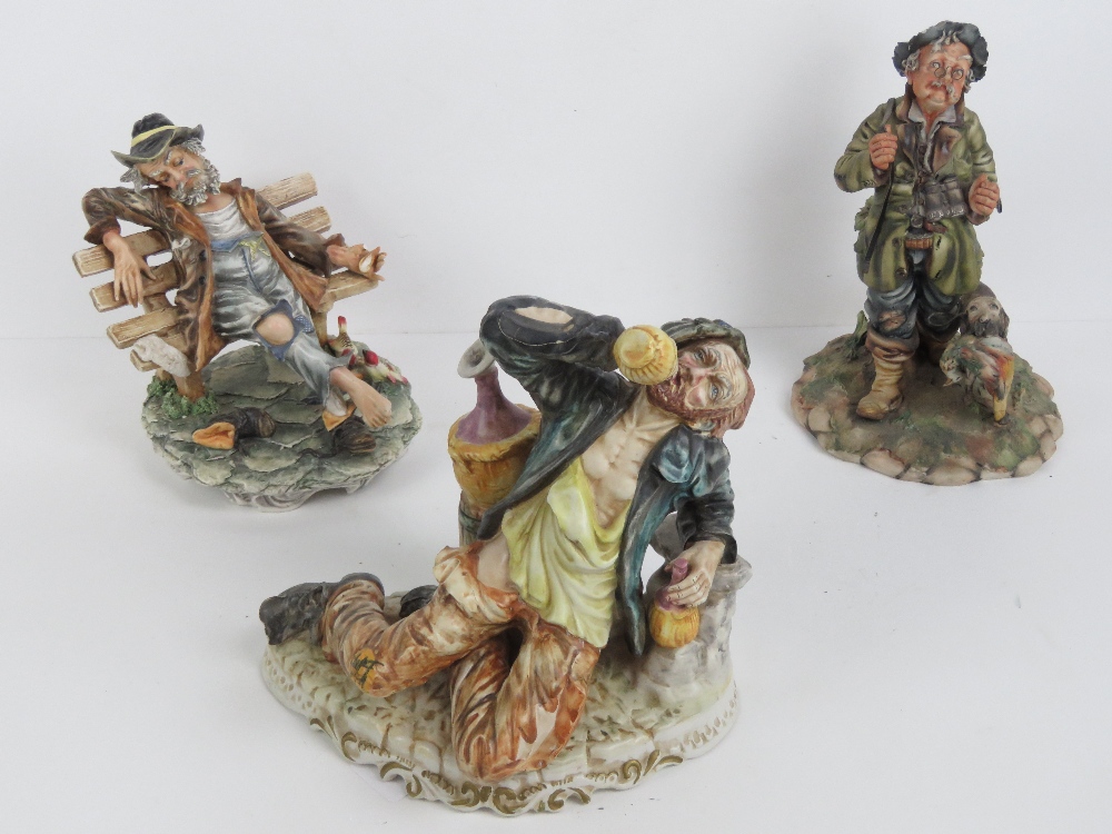 Three large Capodimonte porcelain figures being a man with hunting dog a/f,