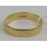 A 9ct gold band hallmarked 375, size Y, 2.5g.