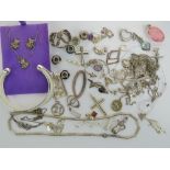 A large quantity of assorted silver and white metal jewellery including;