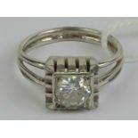 A white metal and diamond ring, the round cut brilliant diamond approx 0.53ct (approx 5.3 x 5.