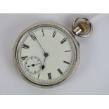 A HM silver top winding open face pocket watch having white enamel dial with subsidiary seconds