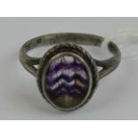 A silver and Blue John ring, the central cabachon approx 9x7mm, size O.