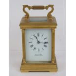 A Continental five glass brass carriage clock having enamelled dial,