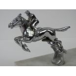 A chrome horse & jockey car mascot, probably by Lejeune, mounted on polished marble base, 13.