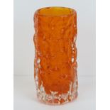 A Whitefriars tangerine glass cylindrical 6" bark vase from the textured range designed by Geoffrey
