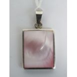 A silver and pink shell square shaped pe