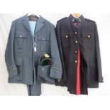 A British Military RAF uniform with jacket, trousers, peaked cap and cummerbund.