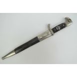 A WWII German Police bayonet being a rare short model for senior NCOs, having eagles head pommel,