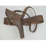 A WWI British Military Officers Sam Browne leather belt with shoulder strap and brass fittings,