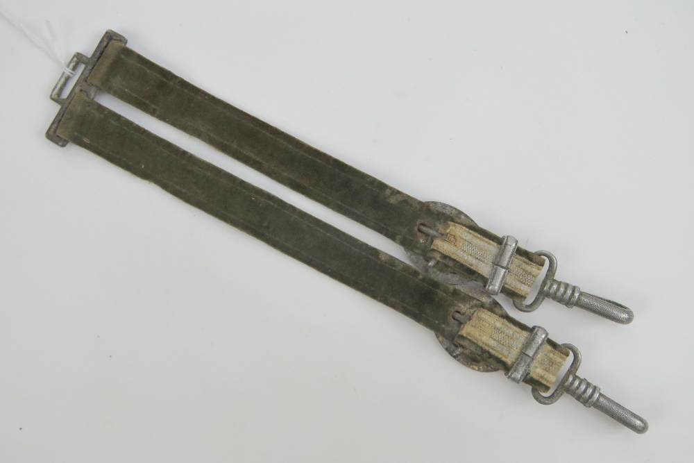 A set of WWII German Army Officers dagger hangers in green with white metal fittings and silver - Image 2 of 2