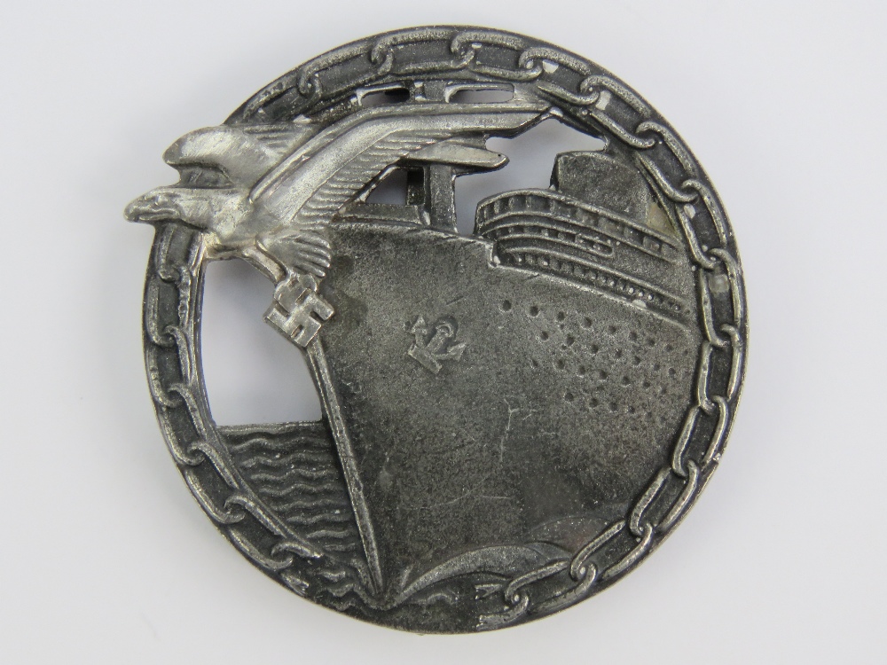 A WWII German Kriegsmarine Blockade Breaker badge with Berlin makers details to back.