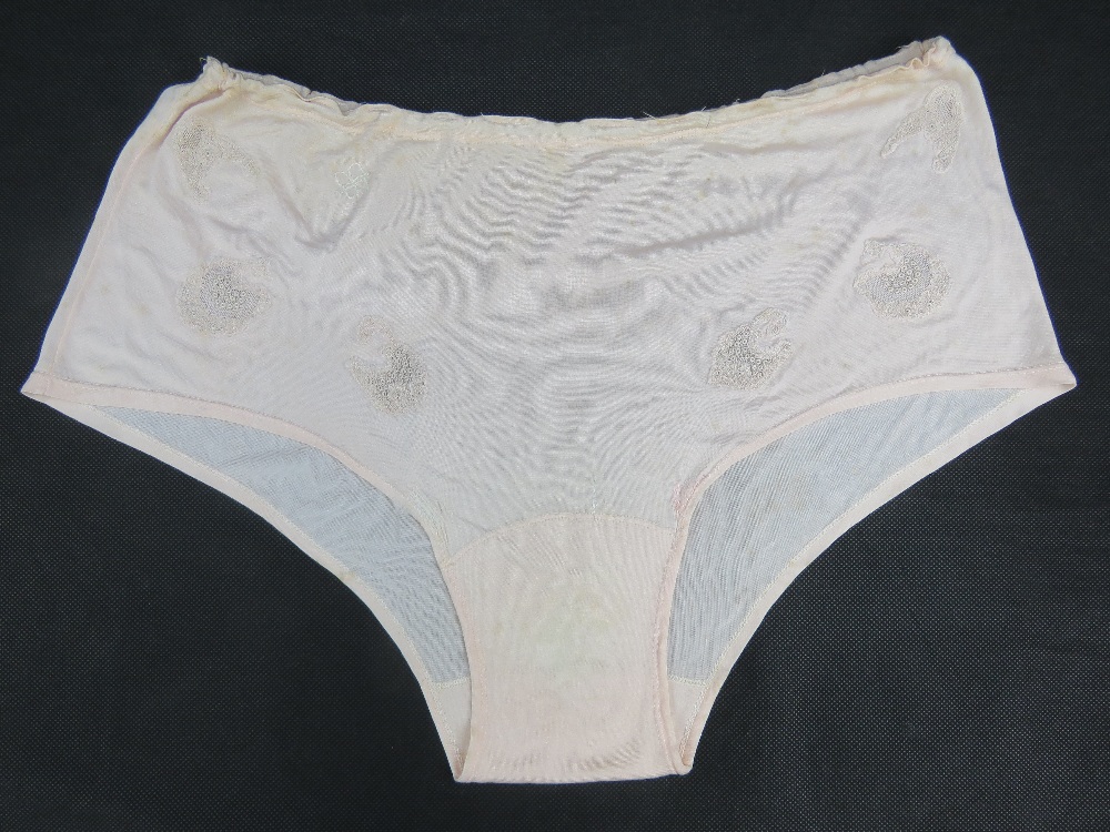 A pair of elasticated vintage silk knickers believed to have been the personal property of Eva