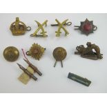 A small quantity of assorted military brass buttons and badges,