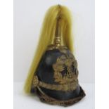 An early 20th century Edward VII Kings Own Norfolk Imperial Yeomanry leather helmet having gilt