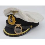A WWII German Kriegsmarine Officers peaked cap made by Sonder Klasse.