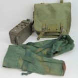 A Soviet Cold War era PKM magazine can with canvas and leather carry bag.