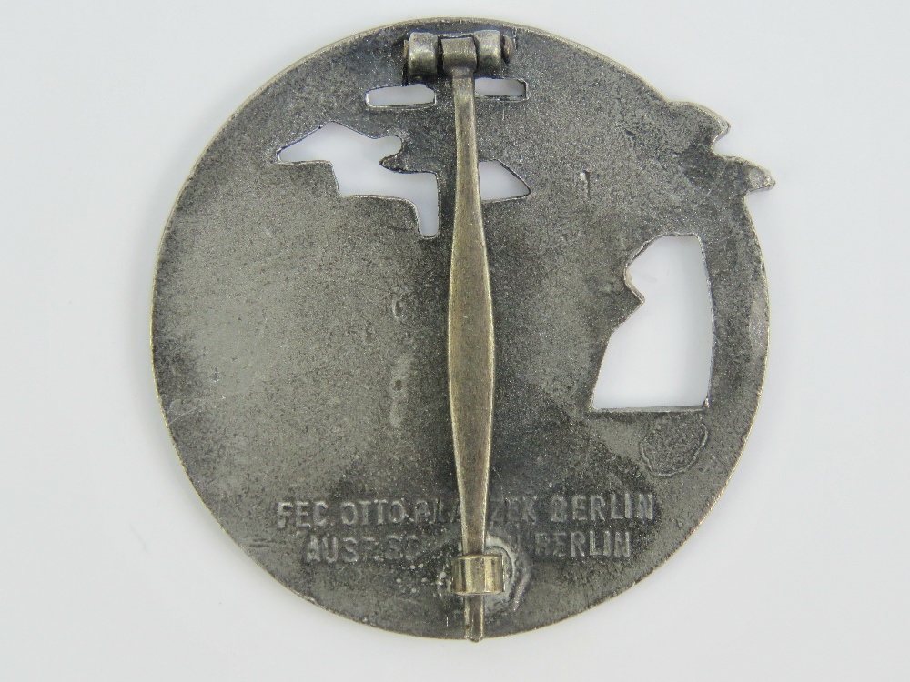 A WWII German Kriegsmarine Blockade Breaker badge with Berlin makers details to back. - Image 2 of 2