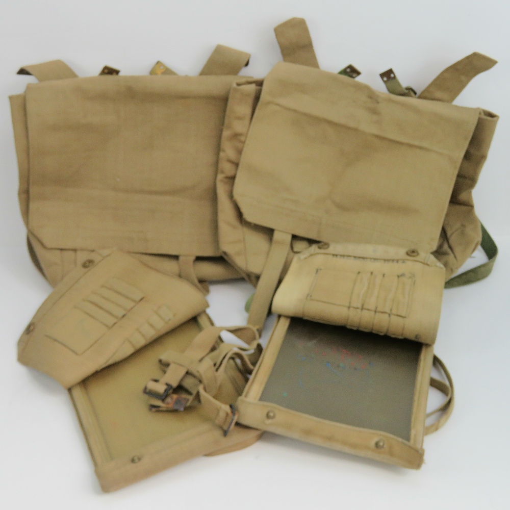 A quantity of assorted British WWII items including two map cases and two back packs.