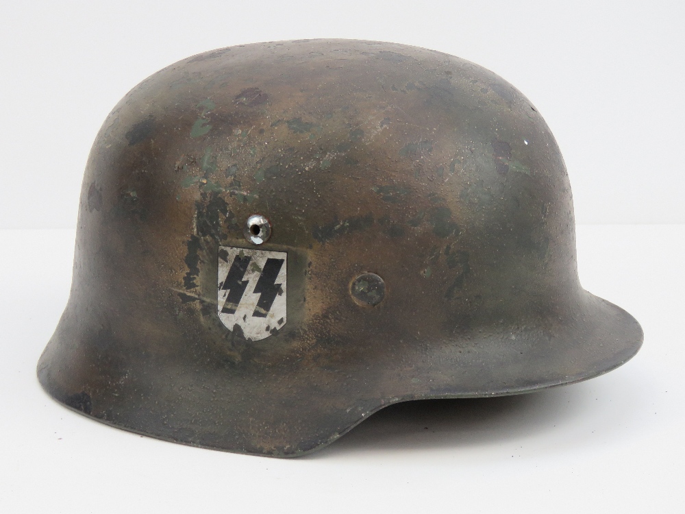 A reproduction film/TV prop WWII SS Helmet,