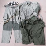 A reproduction WWII US Infantry Battle dress jacket, with trousers and field shirt.