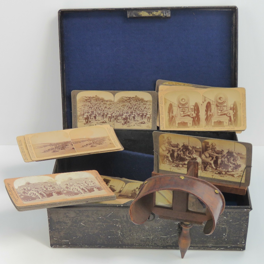 A stereoscopic viewer with 29 3D cards depicting injured soldiers,