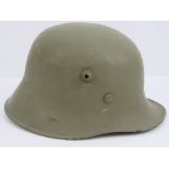 A WWI Austrian / German M16 Infantry issue helmet, repainted,