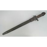 A US WWI issue Remington P14/ P17 rifle bayonet, dated 1917, with scabbard.