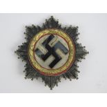 A reproduction WWII German Cross in 'gol