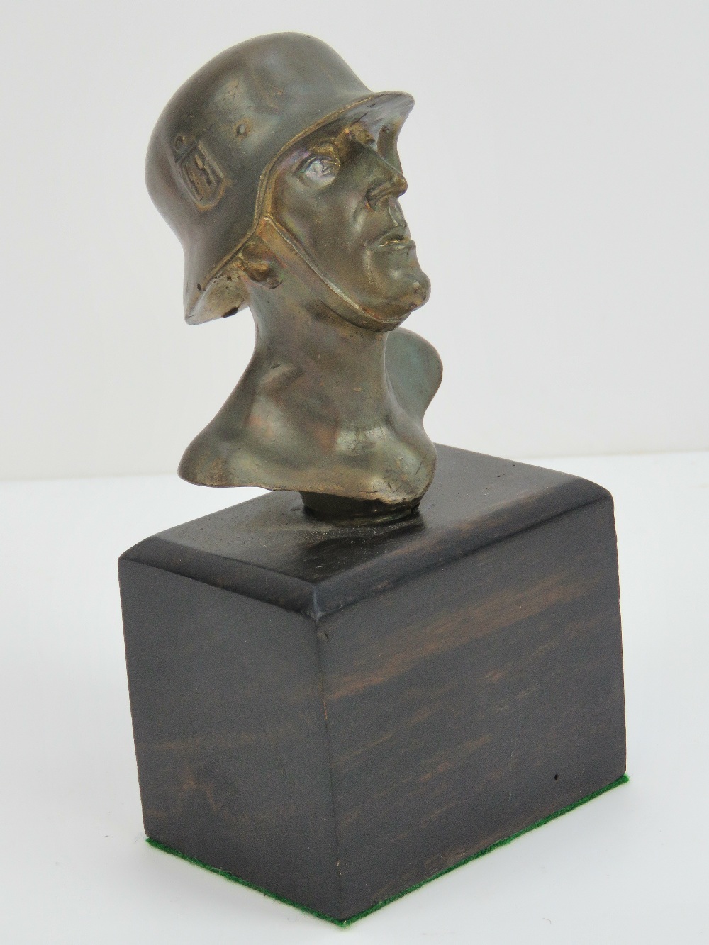 A contemporary gilt metal bust of a WWII