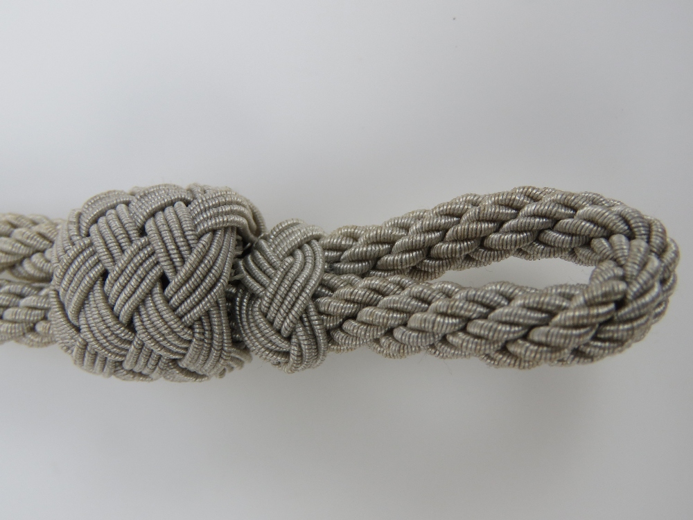 A WWII German Army peak cap cord measuri - Image 2 of 2